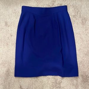 Royal blue front pleated high waisted clasp back vintage Caché skirt.